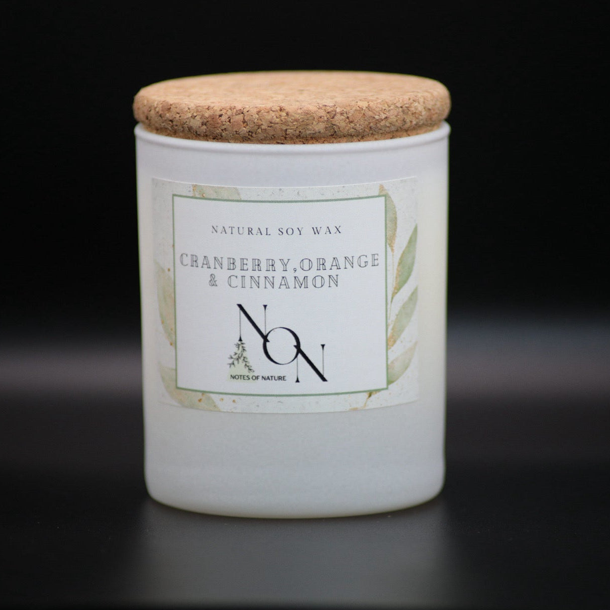 Candle jar with a cork lid on a black background, soy wax, handmande