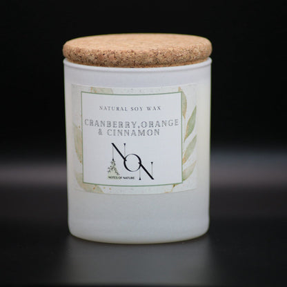 Candle jar with a cork lid on a black background, soy wax, handmande