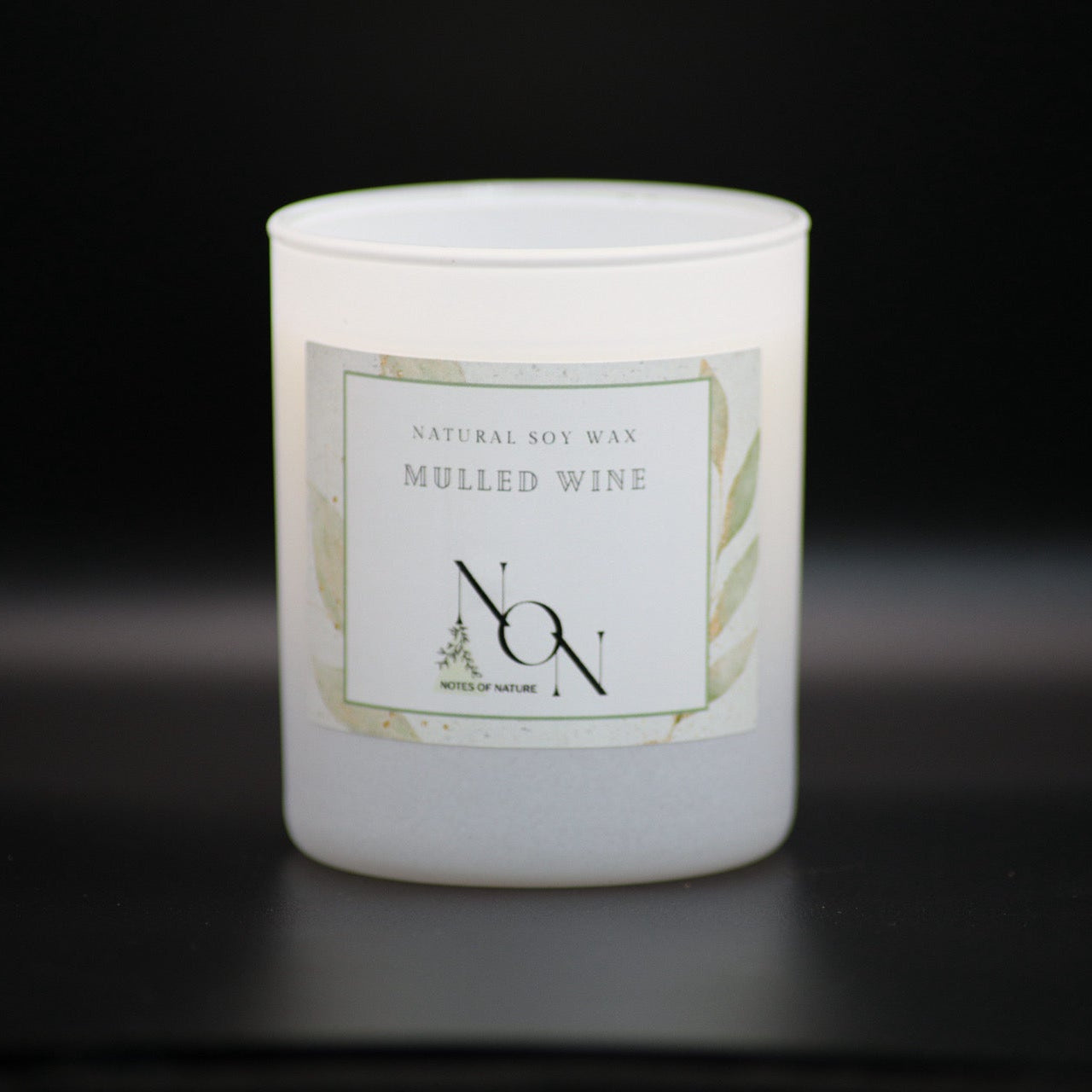 Candle jar with a cork lid on a black background, soy wax, handmande