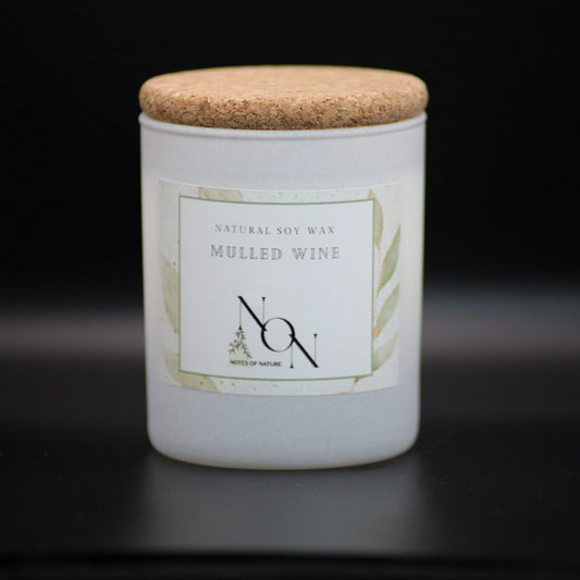 Candle jar with a cork lid on a black background, soy wax, handmande