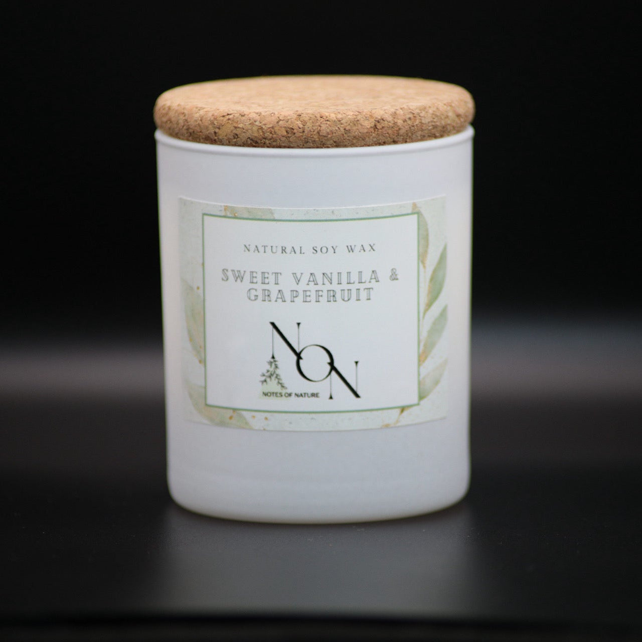 Candle jar with a cork lid on a black background, soy wax, handmande